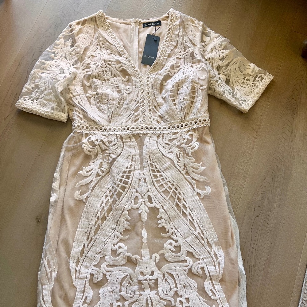 White lace dresses with nude underlay